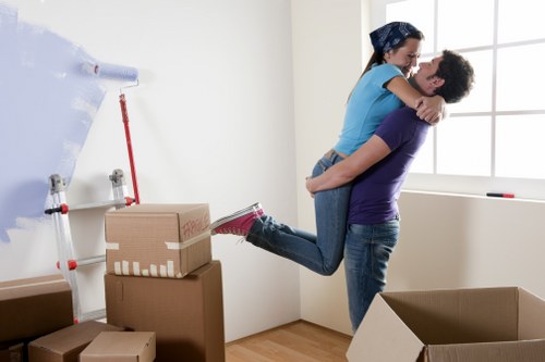 Staff using safe moving equipment during a property move