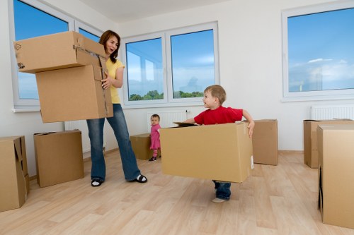 Careful unloading from a moving van in Finsbury
