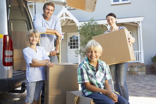 Packing and loading furniture into a removals van