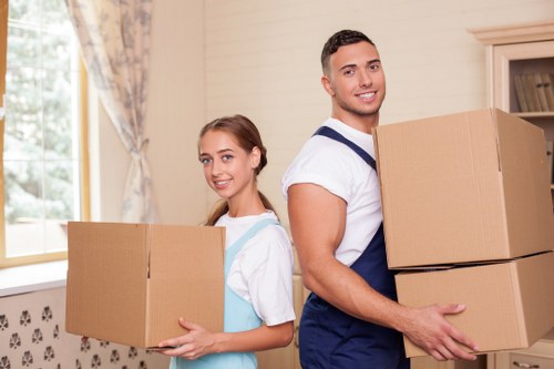 Boxes and office equipment prepared for a business move in central London