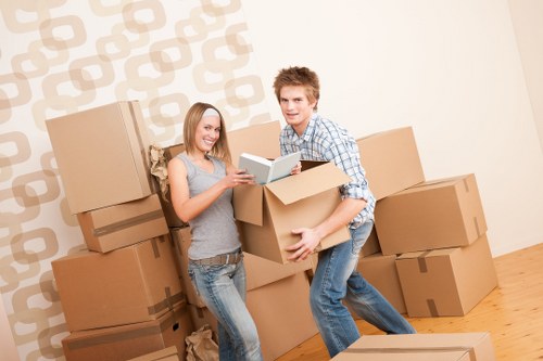 Packed boxes and furniture ready for removals in a Finsbury flat